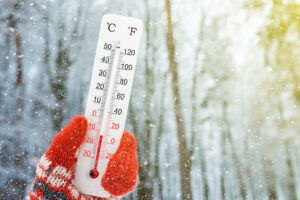 thermometer showing freezing temperatures.