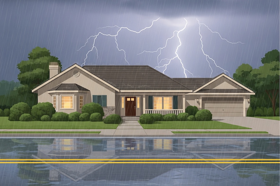 house with a flooded road and lightning