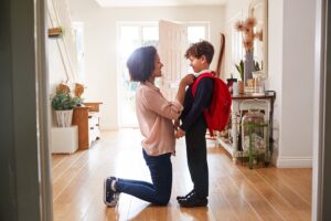 mom sending young child off to school