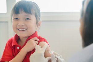 child receiving MMR vaccine