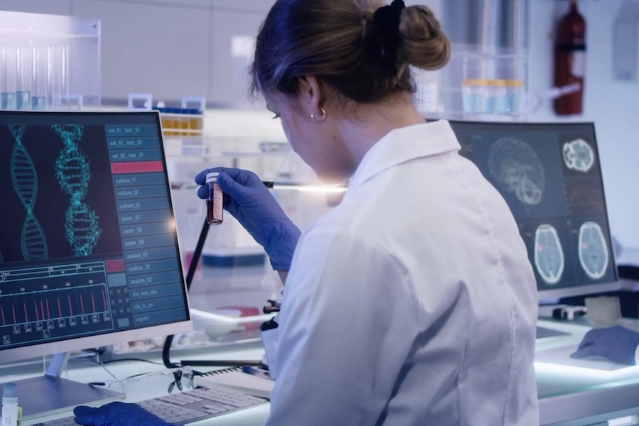 scientist studying DNA in a lab
