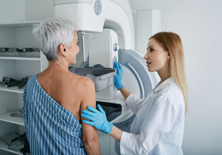 woman receiving mammogram