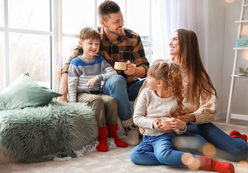 Happy family resting at home
